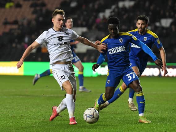 Scott Twine in action against AFC Wimbledon when the sides met in January at Stadium MK