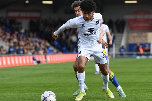 Kaine Kesler-Hayden in action against AFC Wimbledon on Saturday. The Aston Villa loanee has become a regular in the MK Dons side since the injury to Tennai Watson