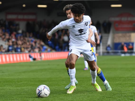 Kaine Kesler-Hayden in action against AFC Wimbledon on Saturday. The Aston Villa loanee has become a regular in the MK Dons side since the injury to Tennai Watson