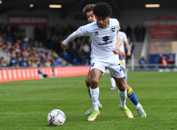<p>Kaine Kesler-Hayden in action against AFC Wimbledon on Saturday. The Aston Villa loanee has become a regular in the MK Dons side since the injury to Tennai Watson</p>