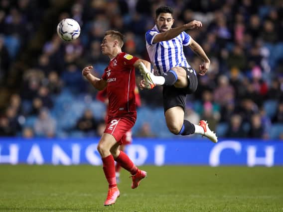 Massimo Luongo battles with Scott Twine at Hillsborough when MK Dons lost 2-1 at Sheffield Wednesday last November