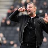 Karl Robinson hopes his Oxford side can get one over on his former club MK Dons to keep their play-off hopes alive.