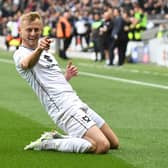Harry Darling celebrates his first class goal against Morecambe at Stadium MK. It was the defender’s ninth goal of the season, and put them in pole position to take the three points on Saturday.