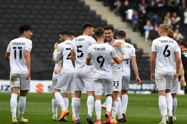 MK Dons have taken the automatic promotion battle to the final day of the season. They take on Plymouth Argyle knowing they need to win to be in with a chance of going up.
