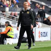 Liam Manning said MK Dons are still under pressure to win at the weekend. No matter what happens, Dons will finish League One in third at the very least but could still win the division.