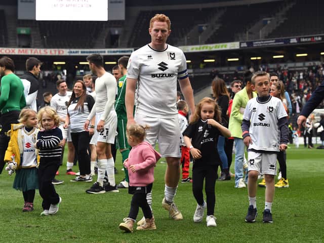 <p>Dean Lewington will continue at MK Dons next season after he confirmed on Sunday night he had signed a new contract with the club</p>