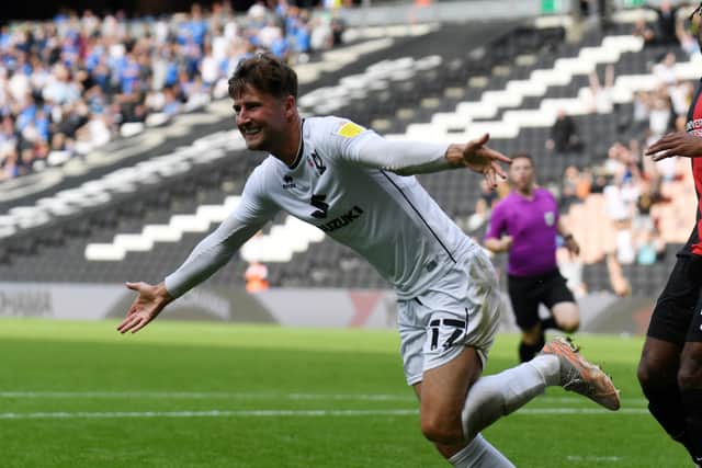 Ethan Robson scored his only MK Dons goal in the 1-0 win over Portsmouth in September. The Blackpool midfielder was a surprise guest at the Player of the Year Awards at Stadium MK last night.