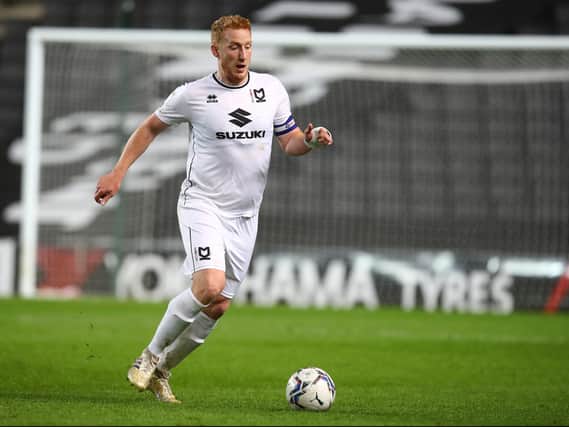 Dean Lewington signed a new one year contract to stay at MK Dons next season. Both Liam Manning and Daniel Harvie praised the skipper for his performances this season.