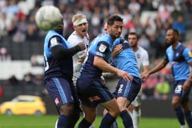 Harry Darling felt the impact of Wycombe Wanderers when the sides met at Stadium MK earlier this season after taking a hit to the head. Dons take on the Chairboys in the play-offs and Darling has said both games will be like cup finals
