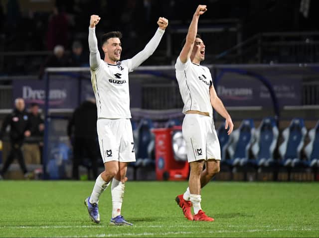 <p>Daniel Harvie and Warren O’Hora celebrate the win over Wycombe at Adams Park earlier this season. Harvie says preparation for the play-offs has been like any other for MK Dons this week.</p>