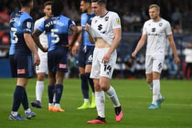 Conor Coventry during the 2-0 defeat to Wycombe Wanderers on Thursday. The West Ham loanee said Dons need to go back to the drawing board to come up with a plan to turn it around at Stadium MK on Sunday