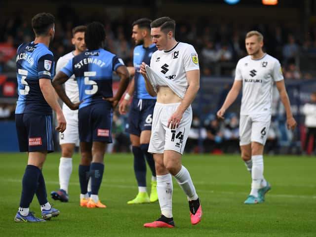 <p>Conor Coventry during the 2-0 defeat to Wycombe Wanderers on Thursday. The West Ham loanee said Dons need to go back to the drawing board to come up with a plan to turn it around at Stadium MK on Sunday</p>