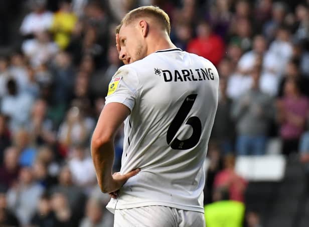 <p>Harry Darling looks crestfallen after MK Dons’ play-off defeat to Wycombe Wanderers on Sunday. Darling was one of Dons’ stand-out performers this season.</p>