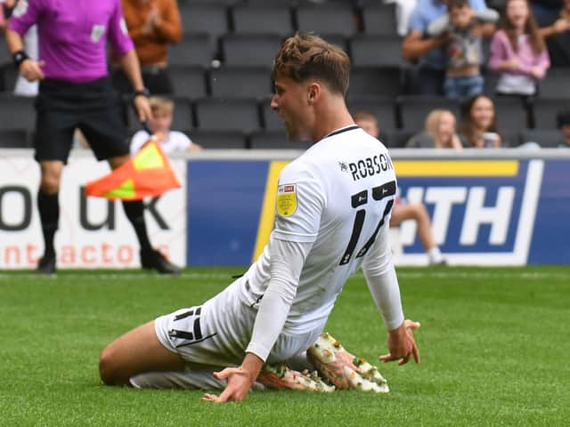 <p>Ethan Robson scored the only goal of the game when Dons beat Portsmouth at Stadium MK. The reverse fixture at Fratton Park would be his last in a Dons shirt before he was recalled by Blackpool</p>