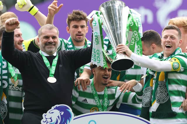 Matt O’Riley, pictured behind manager Ange Postecoglou, left Dons in January for Celtic and helped the Bhoys to the SPL title