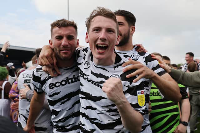 Baily Cargill, left, celebrated his second promotion from League Two, this time with Forest Green Rovers