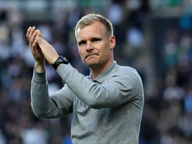 <p>Liam Manning said it was hard to say goodbye to some of the squad as they bid farewell to MK Dons this summer</p>