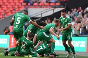 Newport Pagnell Town celebrate Kieran Barnes’ stunning volley to open the scoring at Wembley