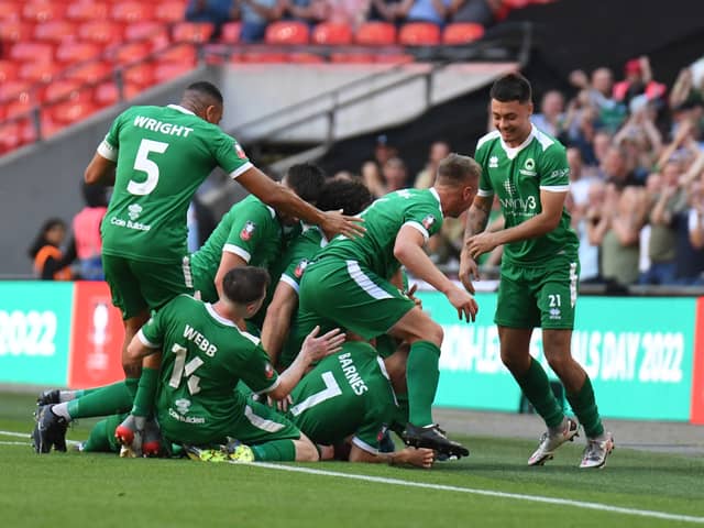 Newport Pagnell Town celebrate Kieran Barnes’ stunning volley to open the scoring at Wembley