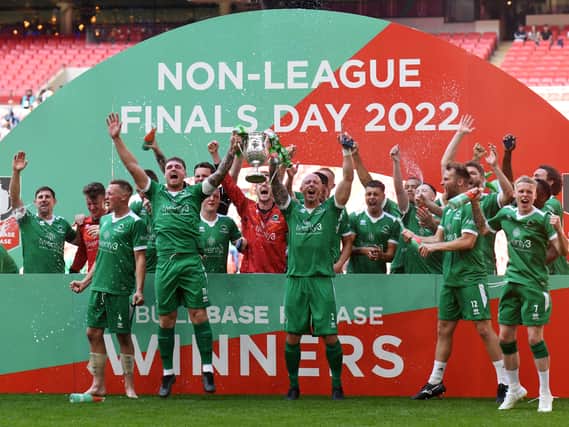 Newport Pagnell Town celebrate winning the FA Vase at Wembley Stadium. They thrashed Littlehampton 3-0 to win the competition for the first time in their history.