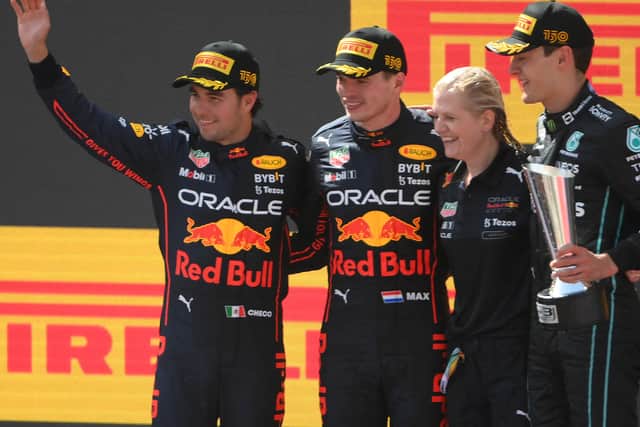 The top three celebrate on the podium at the Spanish Grand Prix