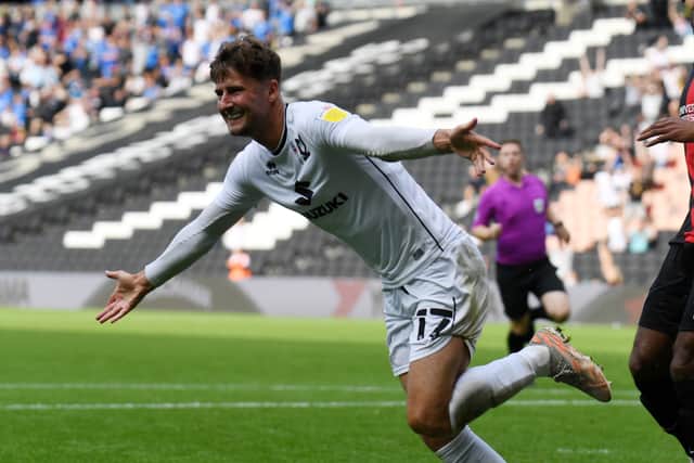 Ethan Robson has completed his move back to MK Dons. The former Blackpool midfielder spent the first half of last season on loan at Stadium MK from Blackpool
