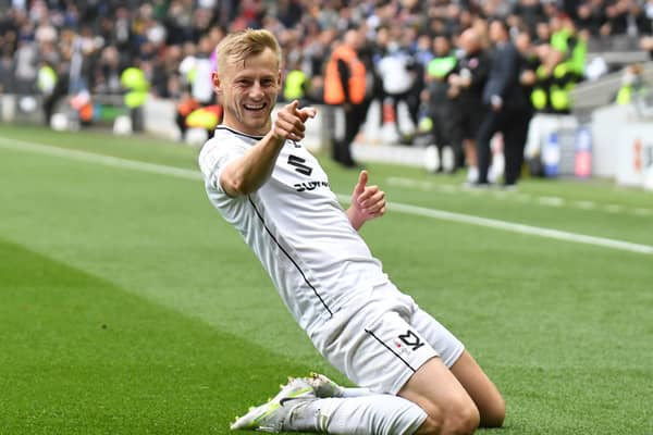 Harry Darling’s move to Swansea City has been confirmed after completing his medical earlier today. Liam Sweeting said the deal will help Dons in both the short and long term.