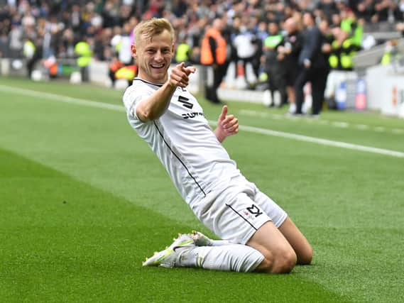 Harry Darling’s move to Swansea City has been confirmed after completing his medical earlier today. Liam Sweeting said the deal will help Dons in both the short and long term.