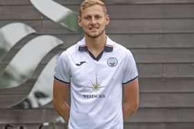 Harry Darling sporting his new Swansea kit after completing his move to Wales on Saturday