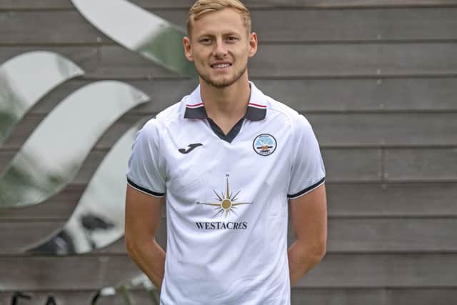 Harry Darling sporting his new Swansea kit after completing his move to Wales on Saturday