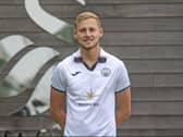Harry Darling sporting his new Swansea kit after completing his move to Wales on Saturday