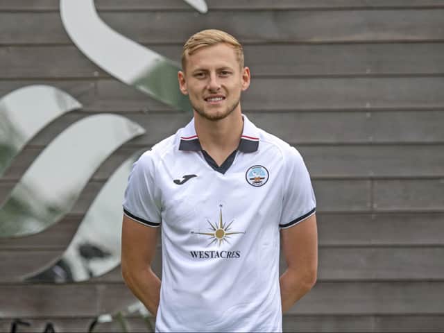 <p>Harry Darling sporting his new Swansea kit after completing his move to Wales on Saturday</p>