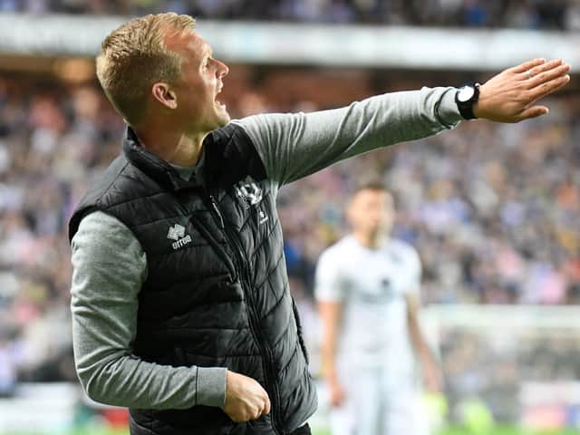 <p>Liam Manning is eager to instil some tactical knowhow into his players during pre-season. MK Dons report back for training on Monday.</p>