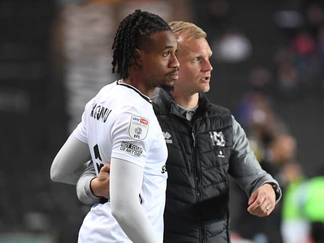 <p>David Kasumu could yet be an MK Dons player next season, with a contract still on offer to him to remain at the club, but Liam Manning admitted time is running out before they start looking elsewhere</p>