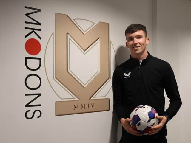 <p>Conor Grant becomes MK Dons’ fifth signing of the season. He joins for an undisclosed fee from Rochdale</p>