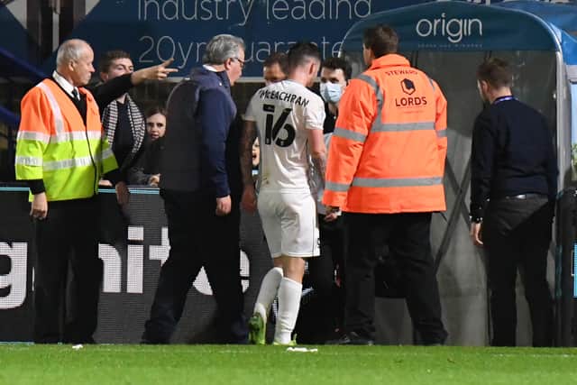 McEachran was sent off in the first leg of Dons’ play-offs against Wycombe Wanderers at Adam's Park