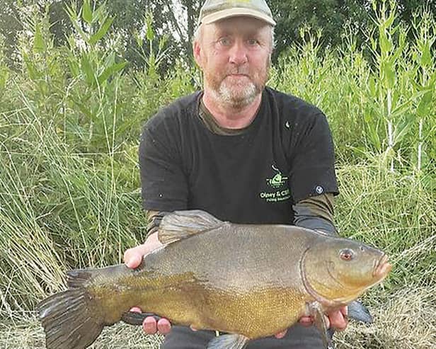 Fish of a lifetime! Ian Barnes' 8-5 RIVER tench