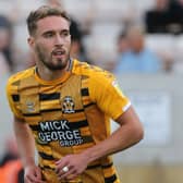 Rumours linked Cambridge United striker Sam Smith to MK Dons earlier this week, but assistant head coach Chris Hogg said even he was surprised by them. 