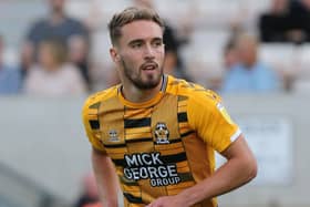 Rumours linked Cambridge United striker Sam Smith to MK Dons earlier this week, but assistant head coach Chris Hogg said even he was surprised by them. 
