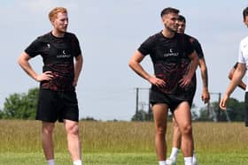 Defenders Dean Lewington and Warren O’Hora have been deployed in a back three formation for the last two years at MK Dons, but that may change for next season