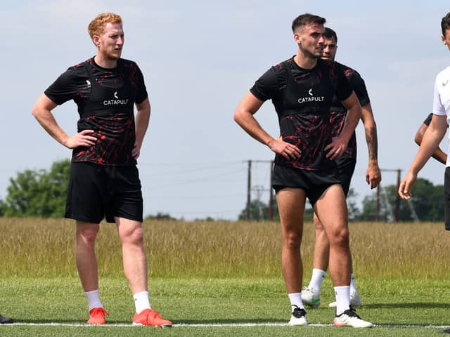 Defenders Dean Lewington and Warren O’Hora have been deployed in a back three formation for the last two years at MK Dons, but that may change for next season