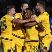 David Kasumu’s first goal for MK Dons came in memorable style against AFC Wimbledon in 2019