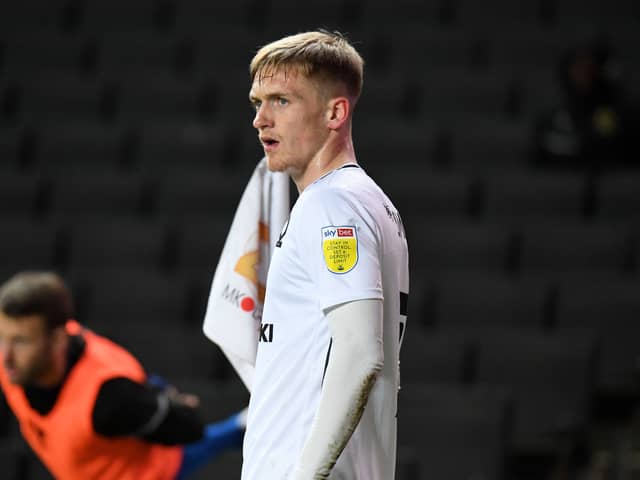 Matt Smith knows he has had to be patient for his opportunity to break into the team at MK Dons after moving from Manchester City in January