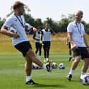 Chris Hogg and Liam Manning working the players during MK Dons’ pre-season training camp