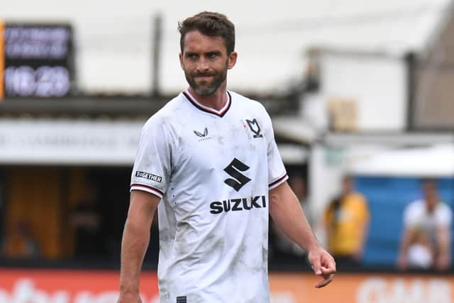Will Grigg in the ‘dirty’ home shirt