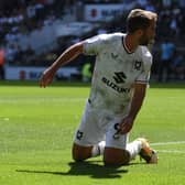 Will Grigg limped out of the game against Sheffield Wednesday with what looked like a hamstring issue, but the striker barely got a chance in the opening two matches for Dons this season