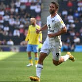 Will Grigg’s injury is not as bad as first feared, Liam Manning has confirmed. But MK Dons may still be in the market for another striker before the close of the window