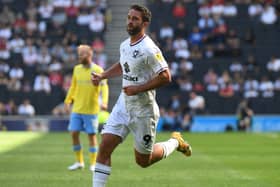 Will Grigg’s injury is not as bad as first feared, Liam Manning has confirmed. But MK Dons may still be in the market for another striker before the close of the window
