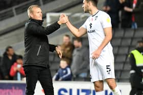 Warren O’Hora said head coach Liam Manning has been integral in changing the culture and mood at Stadium MK during his first year in charge