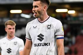Warren O’Hora has signed a new contract at MK Dons